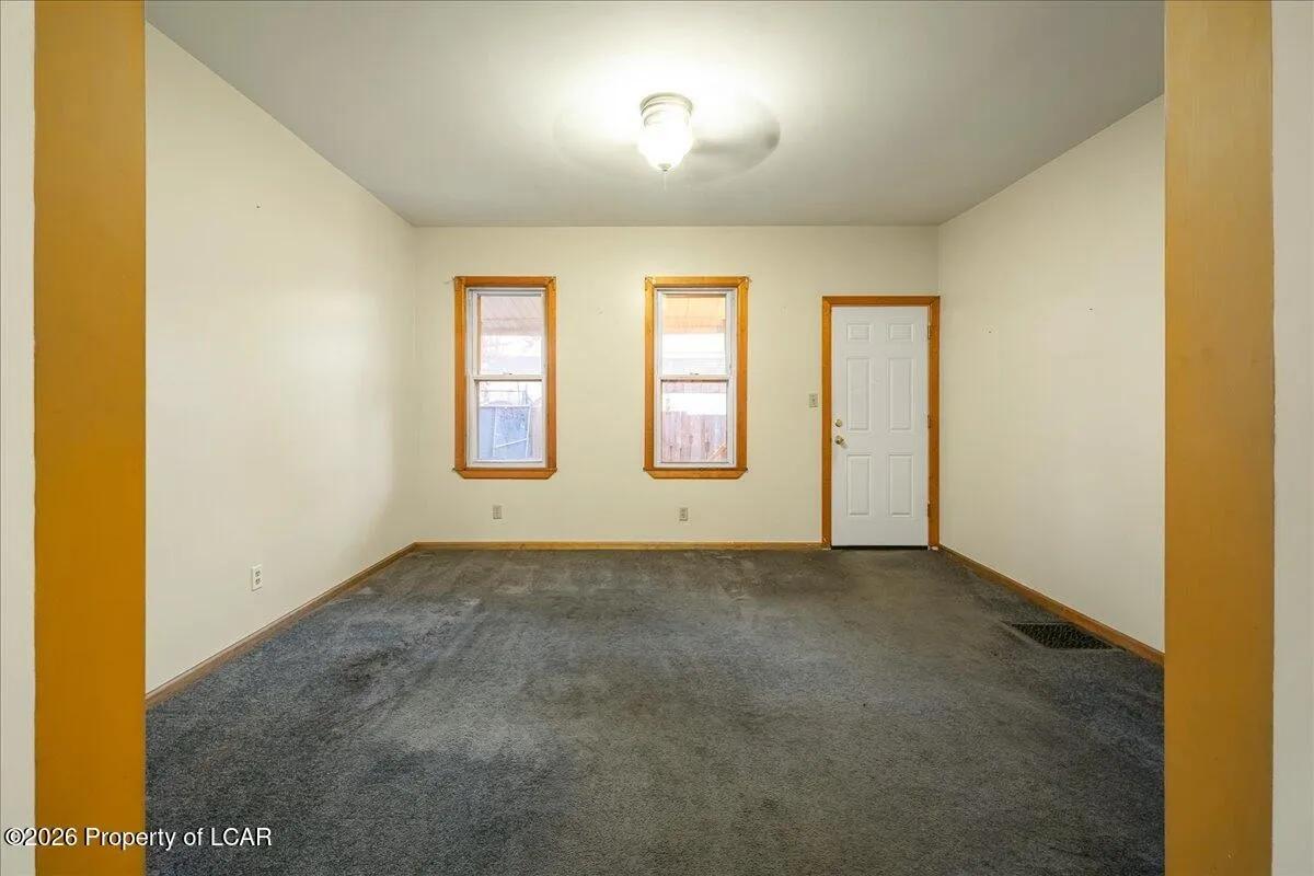 Wilkes-Barre unit room after — neutral paint, cleaned, empty and ready