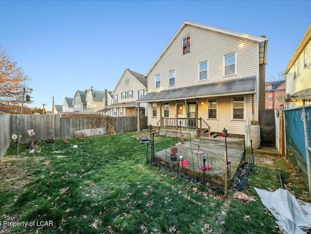 Rear yard and back elevation of the Wilkes-Barre, Pennsylvania two-unit property