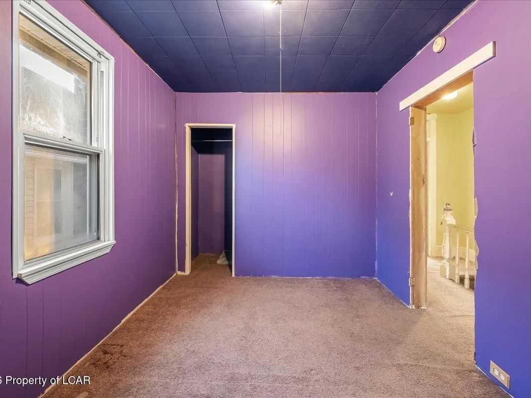 Bedroom with painted panelling in the Wilkes-Barre, PA property
