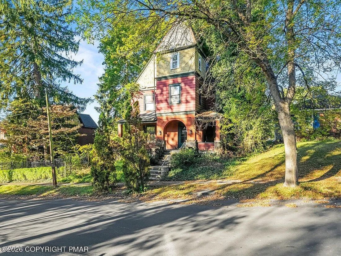 1901 Victorian on First Avenue in Williamsport, PA with turret and original detailing