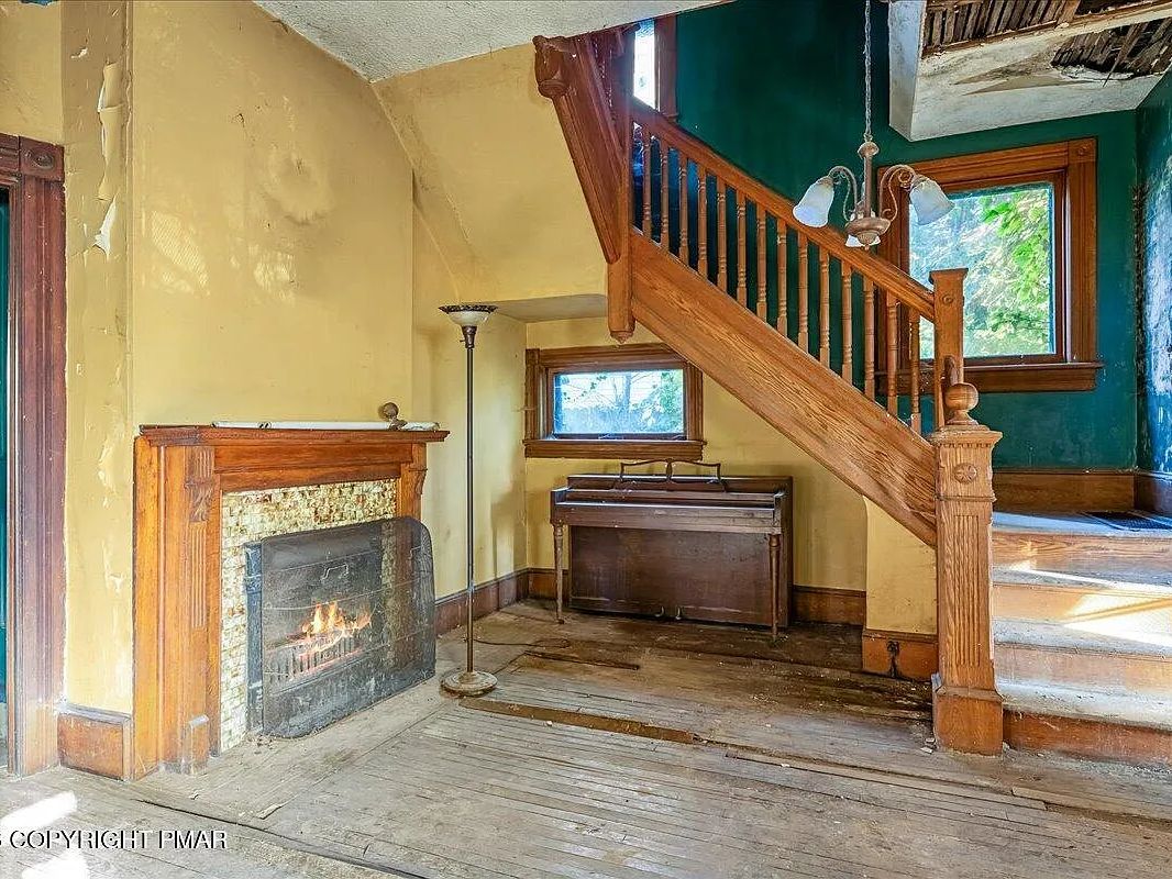 Parlour fireplace and original mantel in the Williamsport, PA Victorian