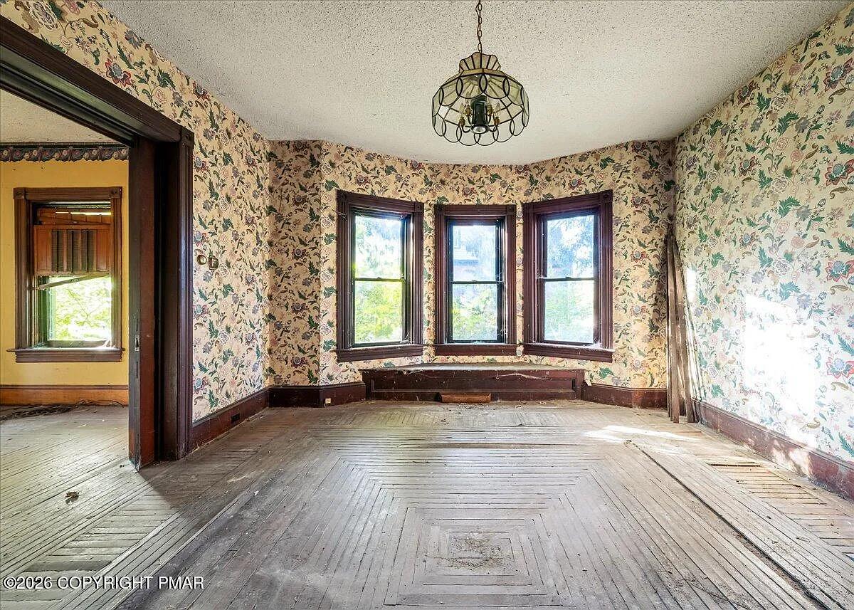 Victorian parlor with bay windows — Scranton PA housing market 2026